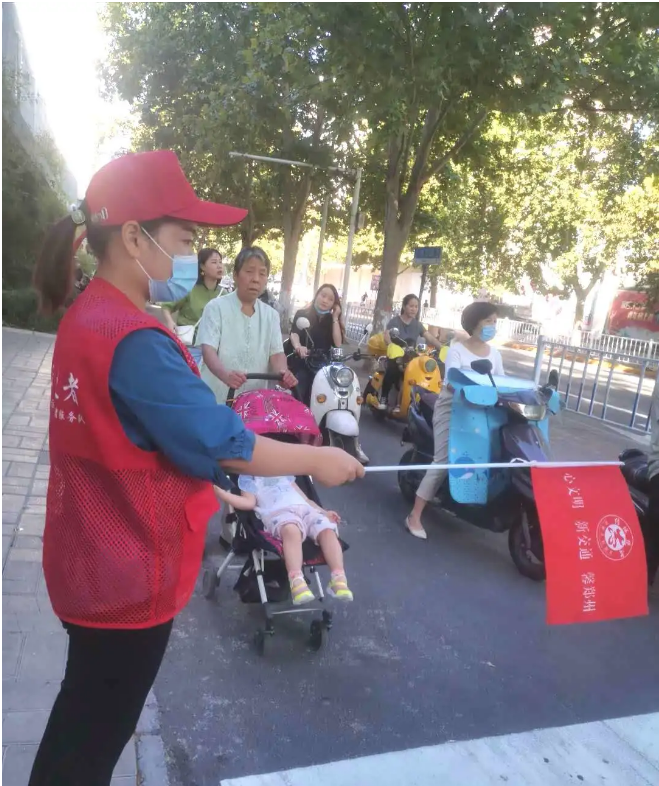 共建文明城市，威廉希尔党委文明交通志愿者在行动